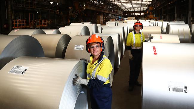 7/6/17: L to R.. Tamara Gluzman and Matthew Giles at the pre paint coil field at the Bluescope Steel works in Port Kembla where colourbond steel is produced John Feder/The Australian