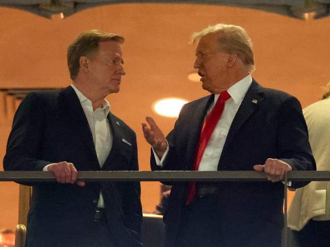 Commissioner of the NFL Roger Goodell (L) meets with US President Donald Trump before the game. Picture: Getty Images