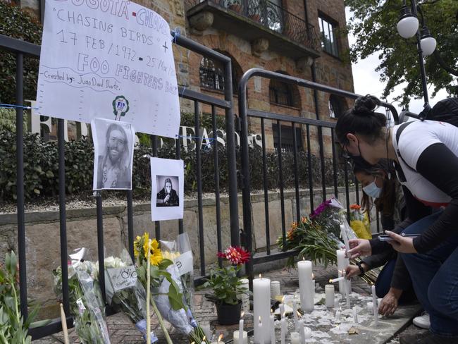 Foo Fighters fans place candles outside Casa Medina Hotel where the band's drummer Taylor Hawkins was found dead on March 26 in Bogota, Colombia. Picture: Getty Images