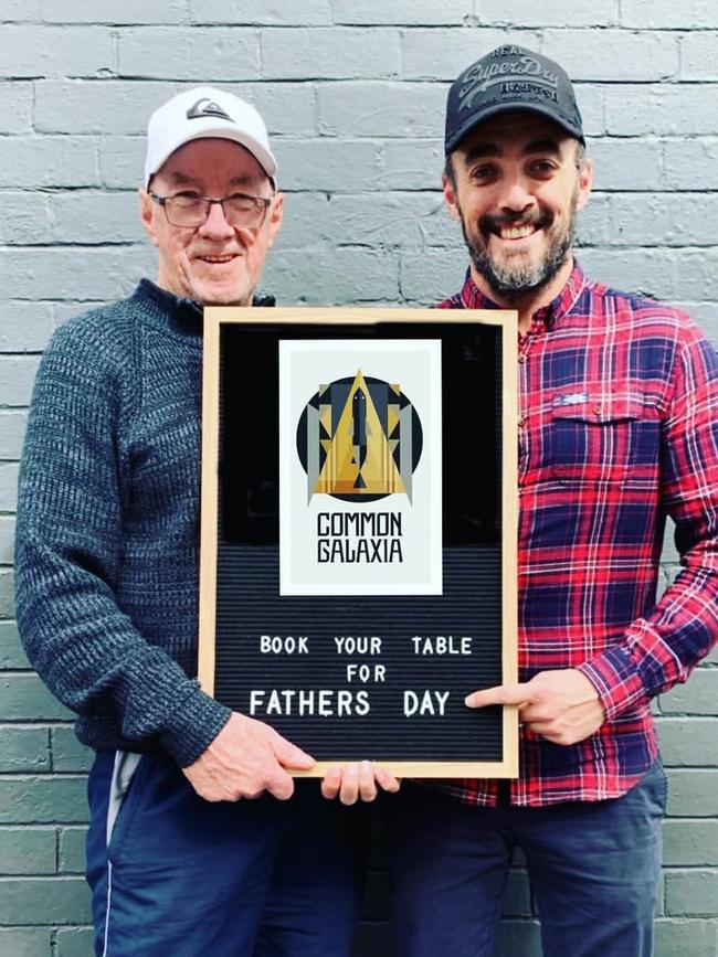 Troy Pannell, right, promoting a Father’s Day special at his cafe Common Galaxia.