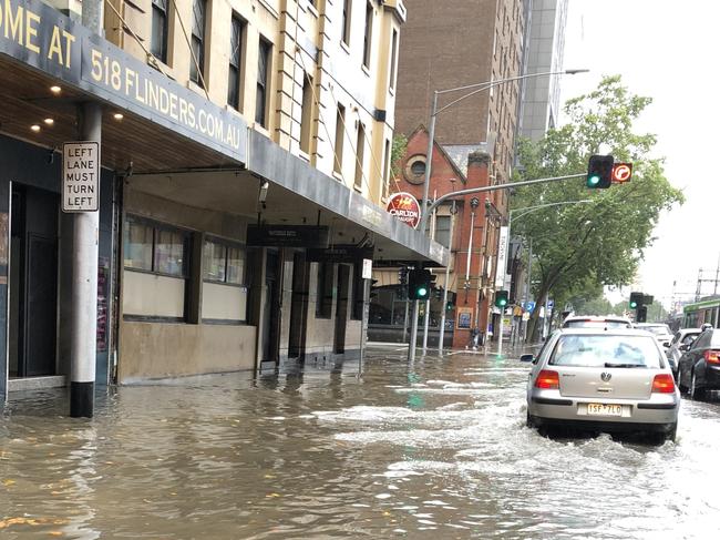 Flinders St flooded outside the Waterside Hotel. Picture: Sue Dunlevy