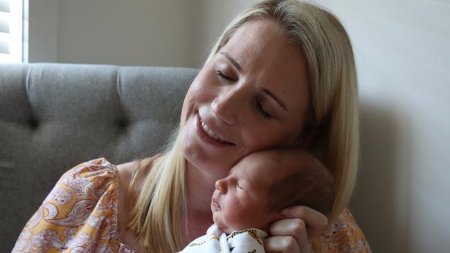 Stephanie Kearney with her newborn son Byron who she helped deliver by C-section. Picture Glenn Hampson