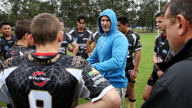 Coach Brad Arthur talking to the Rouse Hill Rhinos players. Picture: Peter Kelly