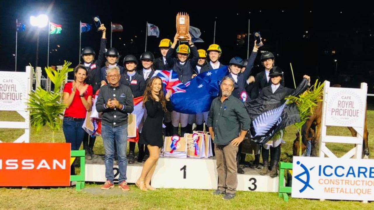 Team Australia celebrate their Royal Pacific Showjumping win in New Caledonia