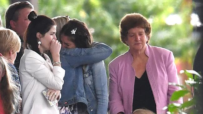 Mourners outside the church following the service. Picture: AAP/Darren England