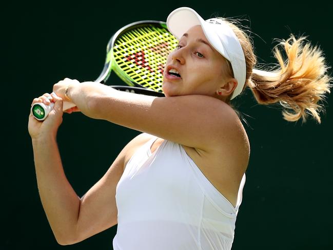 LONDON, ENGLAND - JULY 01: Daria Gavrilova of Australia plays a backhand during the Ladies' Singles first round match against Elina Svitolina of Ukraine during Day one of The Championships - Wimbledon 2019 at All England Lawn Tennis and Croquet Club on July 01, 2019 in London, England. (Photo by Alex Pantling/Getty Images)