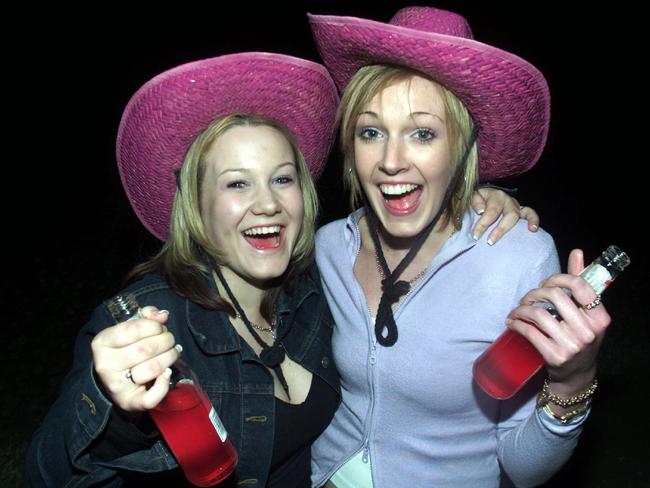 Next door neighbours from Bundoora Fiona Kelly, 18, and Olivia McFarlane, 19, toasted the end of 2001 at Sorrento.