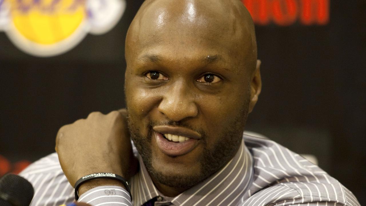 FILE - In this July 31, 2009, file photo, Los Angeles Lakers' Lamar Odom speaks to the media during a news conference after the Lakers signed Odom to a multi-year NBA basketball contract, in El Segundo, Calif. Odom spent most of his 14-year NBA career in Los Angeles with the Lakers and Clippers, becoming a fan favorite before he sought even more fame with the Kardashians. Odom, who was embraced by teammates and television fans alike for his Everyman approach to fame, was found face-down and alone Tuesday, Oct. 13, 2015, after spending four days at the Love Ranch, a legal Nevada brothel. (AP Photo/Jeff Lewis, File)