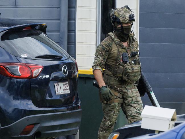 Police on the scene at Empire Street in Lawnton where SERT officers arrested a number of offenders on New Years Eve. Picture Lachie Millard