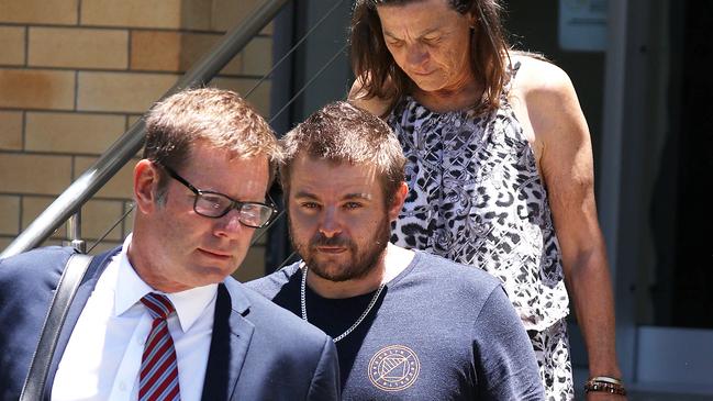 Kerrod Frahm leaves Murgon Magistrates Court on Tuesday with his lawyer Andrew Bale and a family supporter following his appearance on a manslaughter charge over the death of his son. Picture: Liam Kidston