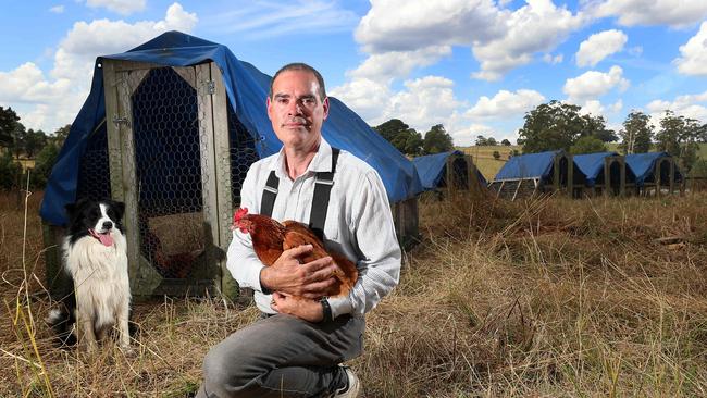 Ilan Goldman, of Mirboo Pastured Poultry at Mirboo North, raised his meat chickens in mobile hutches, moved to fresh pasture daily to give birds constant access to the outdoors so they could graze and fertilise paddocks. Picture: Yuri Kouzmin