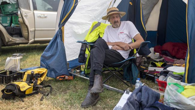 Andrew Spencer at his makeshift accommodation at the Cobargo Showgrounds. Picture: Sean Davey.