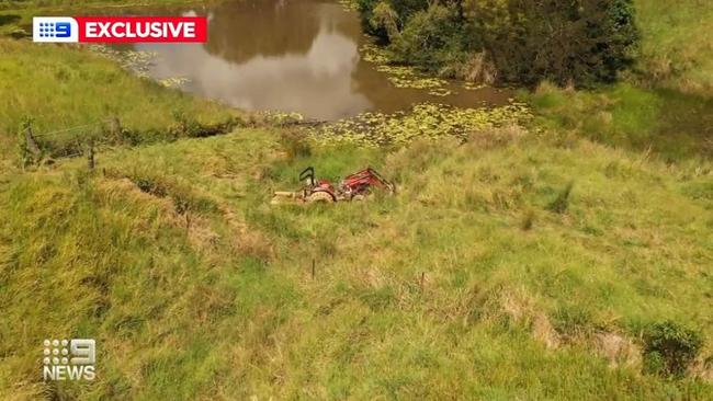 The 95-year-old farmer was trapped in the dam after his tractor got bogged. Photo: Nine News.