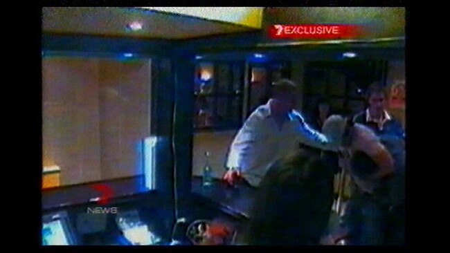 Vision showed Brendan Fevola grab a bar man at the Imperial Hotel. Pic: Channel 7