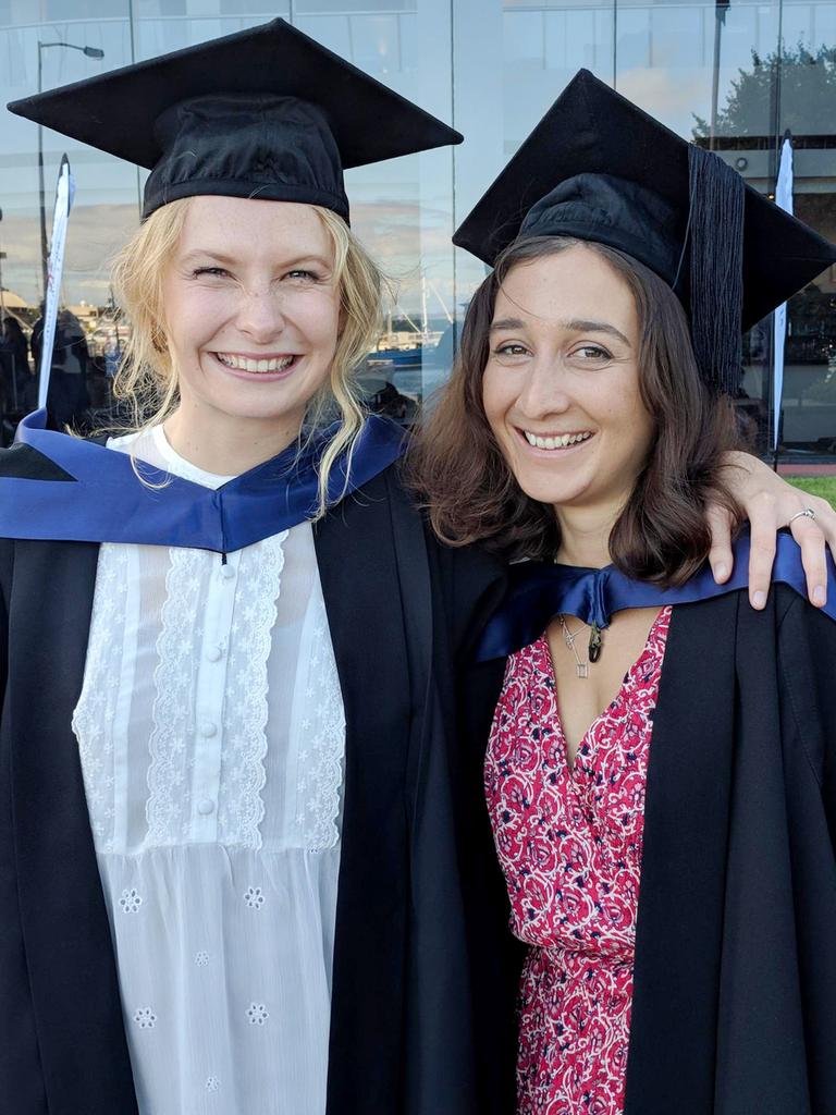 Bachelor of Arts graduates Zia Sikoro, left, and Madeleine Rojahn. Picture: SUPPLIED