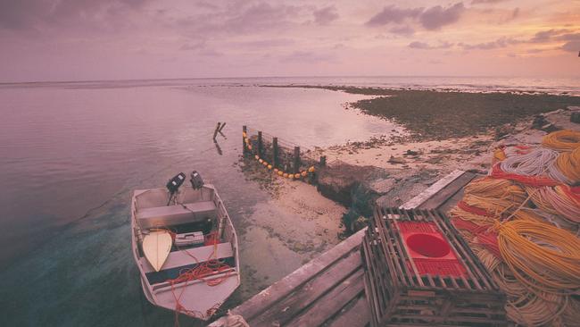 Boat and crayfish pots at Houtman Abrolhos Islands. Picture: Tourism WA