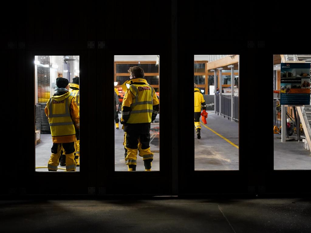 Crew members return to the lifeboat station after being involved in the rescue operation. Picture: Getty Images