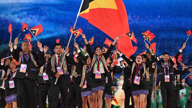 Eat Timor’s team marches on the opening ceremony of the Asian Games at the Hangzhou at the weekend. Picture: AFP