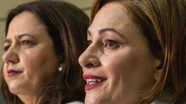 Queensland Premier Annastacia Palaszczuk and Treasurer Jackie Trad (right) speak during the state government's 2019-20 Queensland budget media briefing.