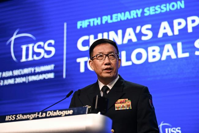 Chinese Defence Minister Dong Jun speaks Sunday at the 21st Shangri-La Dialogue summit in Singapore