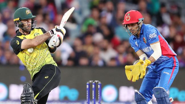 ADELAIDE, AUSTRALIA - NOVEMBER 04: Glenn Maxwell of Australia and Rahmanullah Gurbaz of Afghanistan during the ICC Men's T20 World Cup match between Australia and Afghanistan at Adelaide Oval on November 04, 2022 in Adelaide, Australia. (Photo by Sarah Reed/Getty Images)