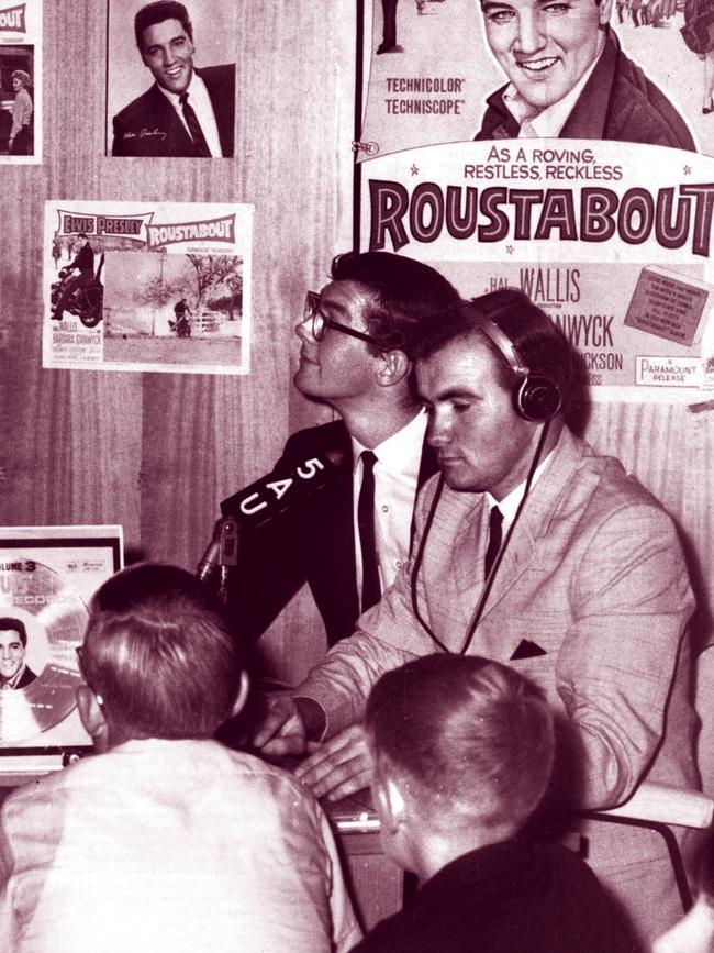 SA radio presenter Bob Byrne with John Cronin broadcasting for Radio 5AU at the opening of the Elvis Presley film Roustabout in 1964. Picture: Advertiser Library