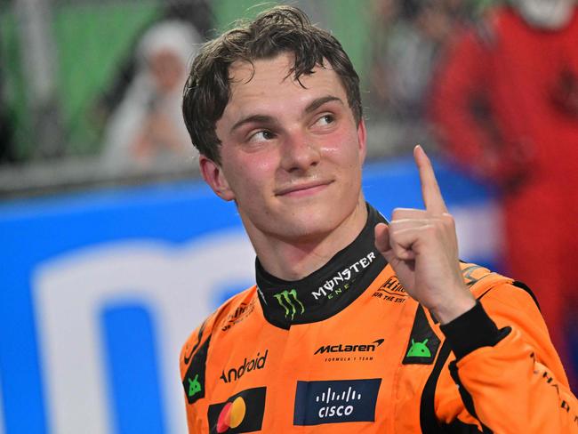 McLaren's Australian driver Oscar Piastri celebrates winning the 2025 Saudi Arabia Formula One Grand Prix at the Jeddah Corniche Circuit on April 20, 2025. (Photo by Giuseppe CACACE / AFP)