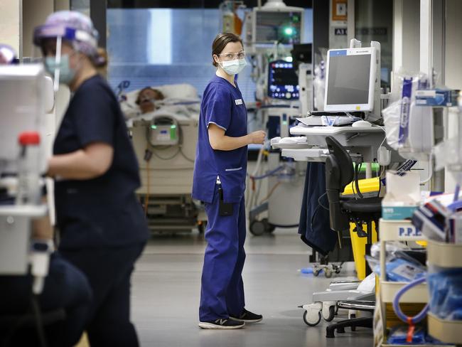 Staff at Royal Melbourne Hospital’s ICU ward. Picture: David Caird