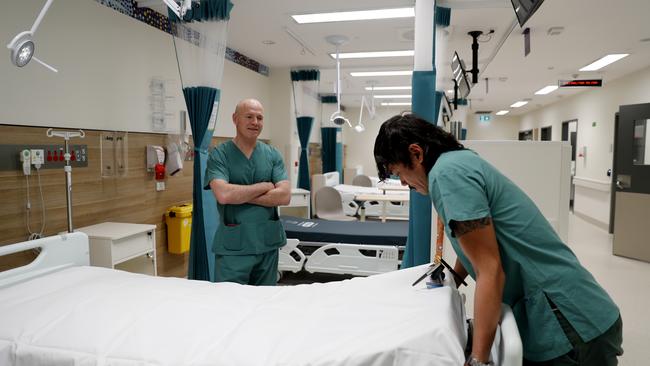 St Vincent's Hospital emergency medical director Paul Preisz talks to staff in the hospital’ new mental health unit in Sydney. Picture: Nikki Short