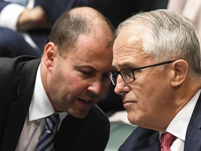 Australian Energy Minister Josh Frydenberg speaks to Mr Turnbull. Picture: AAP