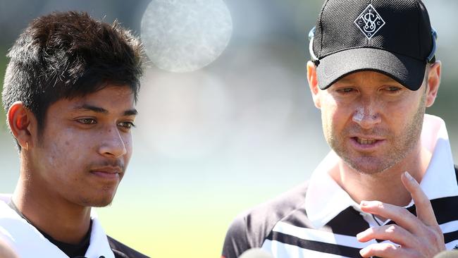 SYDNEY, AUSTRALIA - SEPTEMBER 24:  Michael Clarke and Sandeep Lamichhane speak to the media during the innings break during the Mosman v Western Suburbs first grade match at Allan Border Oval on September 24, 2016 in Sydney, Australia.  (Photo by Mark Metcalfe/Getty Images)