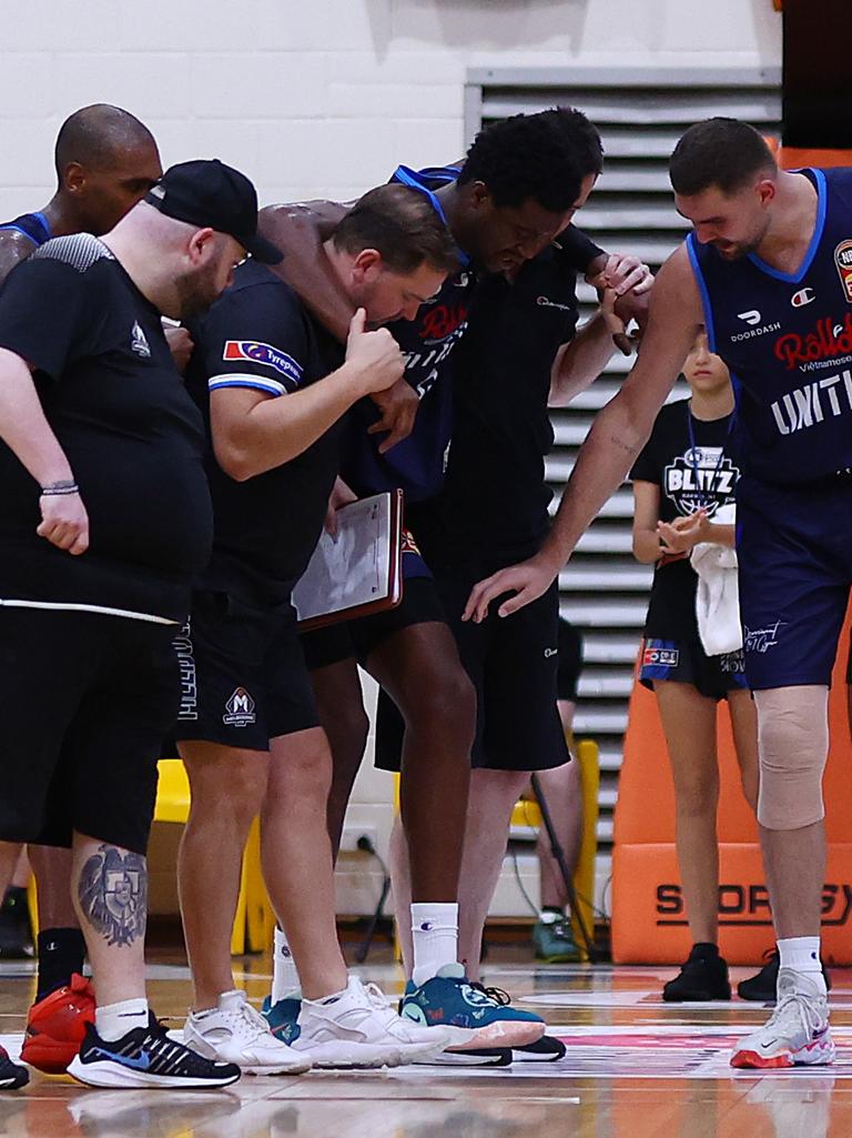 Ariel Hukporti is helped from the floor last September after suffering a ruptured Achilles tendon. Picture: Getty Images