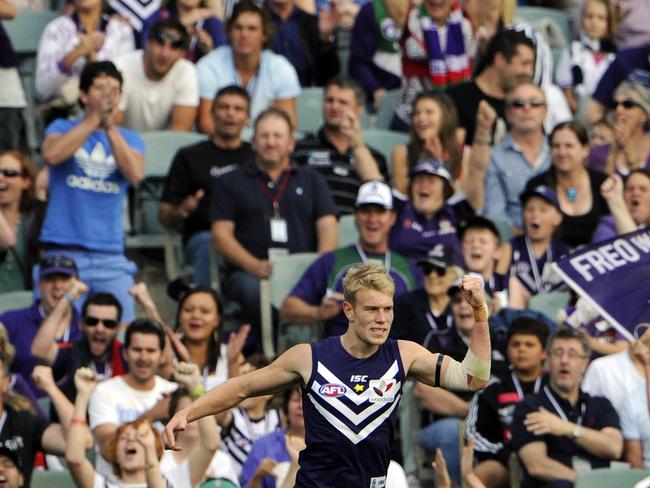 AFL Round 1- Fremantle Dockers v Geelong Cats at Patersons Stadium. PICTURED- Frematle's Josh Mellington celebrates a goal.