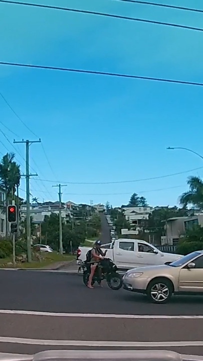 E-bike rider just misses getting struck by car