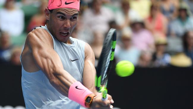 Rafael Nadal hitting a return in his fourth round win over Argentina's Diego Schwartzman.