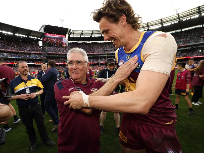 Brisbane coach Chris Fagan celebrates with Joe Daniher after winning the AFL Grand Final. Picture: Phil Hillyard