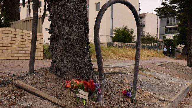 Flowers left at the scene of the fatal motorbike crash on Seaview Rd, Henley Beach. Picture: Ben Clark