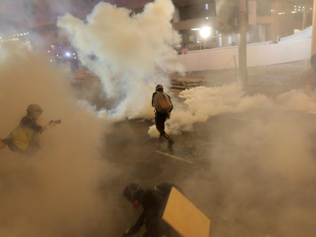 Hong Kong riots: Police use tear gas on protesters | news.com.au ...