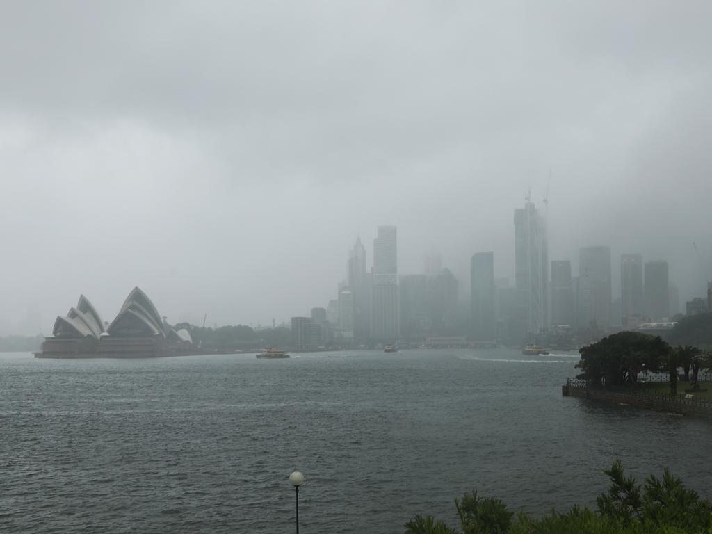 Heavy rain again lashes Sydney ,seen from Kirribilli. Picture John Grainger