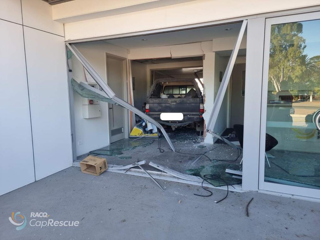 A man allegedly tried to flee the scene of a crash after allegedly driving into the office of the RACQ CapRescue hangar near Rockhampton Airport.