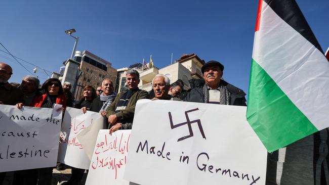 Palestinians protest in front of the German representation in the city of Ramallah, against Germany’s support of Israel in the ongoing war.