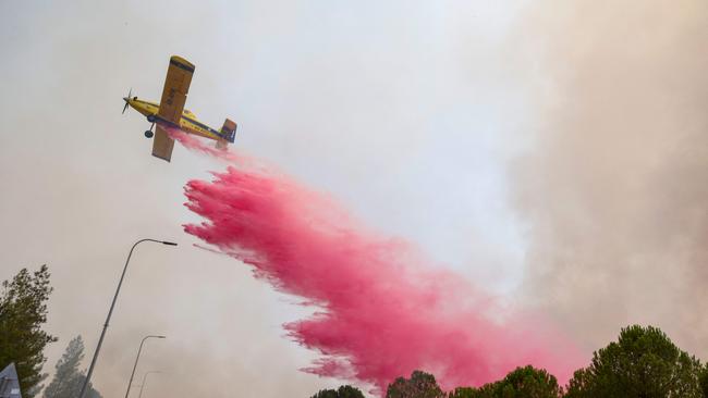 An Israeli firefighting plane drops flame retardant in northern Israel. Picture: AFP