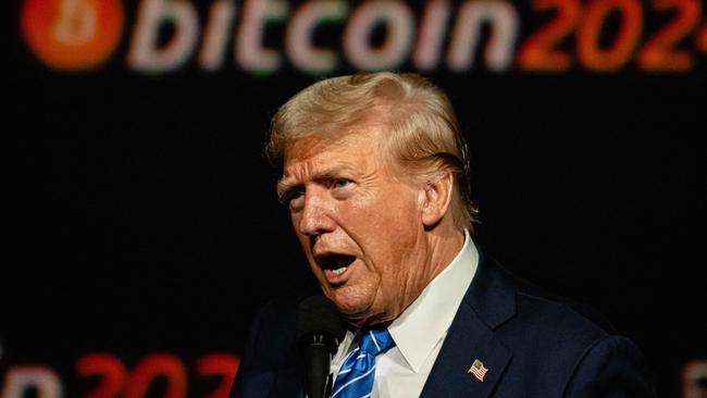 (FILES) Former President and 2024 Republican presidential candidate Donald Trump gives a keynote speech on the third day of the Bitcoin 2024 conference at Music City Center July 27, 2024 in Nashville, Tennessee. Trump's triumphant return to the White House signals a potential golden era for cryptocurrencies, whose influential backers heavily supported his presidential bid. After years of ascendancy following bitcoin's emergence, the cryptocurrency industry had fallen into a "crypto winter," plagued by scandals and hostile regulatory oversight. But Trump's impending presidency has spurred an enthusiastic market response, with bitcoin surging more than 25 percent in a week and breaking through the $90,000 mark for the first time. (Photo by Jon CHERRY / GETTY IMAGES NORTH AMERICA / AFP)