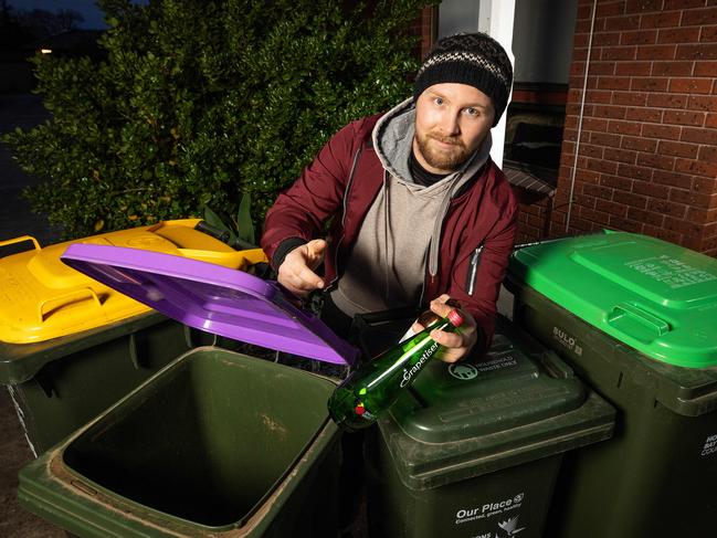 Williamstown resident Jacob Matray. Councils will get $127m for replacing bins and introducing purple lid bins for glass to ensure every household in the state becomes a 4 bin property. Picture: Mark Stewart