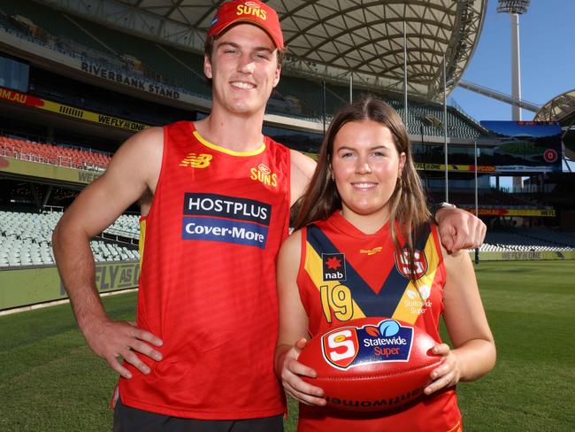 Alex Ballard with her older brother Charlie, who’s played 69 games in four seasons for the Gold Coast Suns. Picture: Emma Brasier