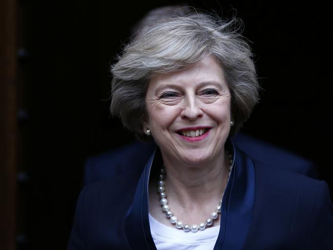 Theresa May emerges to speak to reporters after being confirmed as the leader of the Conservative Party and Britain's next Prime Minister outside the Houses of Parliament in Westminster, central London, July 11, 2016. REUTERS/Neil Hall - RTSHFDZ