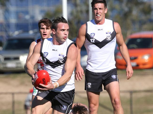 NEAFL, Southport Sharks v Redland Bombers match played at Southport. Sharks Player No 3 Haydn Kiel Bombers player No 3 Matthew Thomson