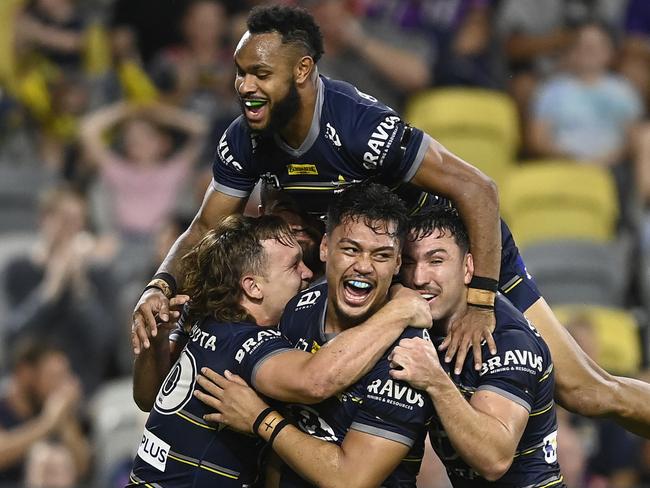 TOWNSVILLE, AUSTRALIA - MAY 21:  Jeremiah Nanai of the Cowboys celebrates after scoring a try  during the round 11 NRL match between the North Queensland Cowboys and the Melbourne Storm at Qld Country Bank Stadium, on May 21, 2022, in Townsville, Australia. (Photo by Ian Hitchcock/Getty Images)