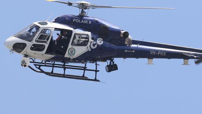 EYE IN THE SKY: A POLAIR resource maintained surveillance while officers on the ground used road spike to stop a Mercedes Benz allegedly stolen in Surfers Paradise after it was driven into NSW. File Photo: NCA NewsWire / Dylan Coker