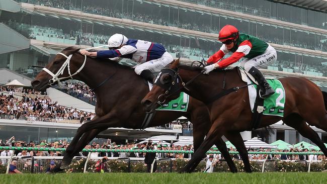 MELBOURNE, AUSTRALIA - NOVEMBER 02: James McDonald rides #1 Atishu to win race 8, the Tab Empire Rose Stakes during 2024 Penfolds Victoria Derby Day at Flemington Racecourse on November 02, 2024 in Melbourne, Australia. (Photo by Robert Cianflone/Getty Images)